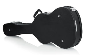Gator Classical Guitar Case: Black hard-shell wood case with ergonomic handle, thick plush lining, and interior accessory compartment for classical guitars.