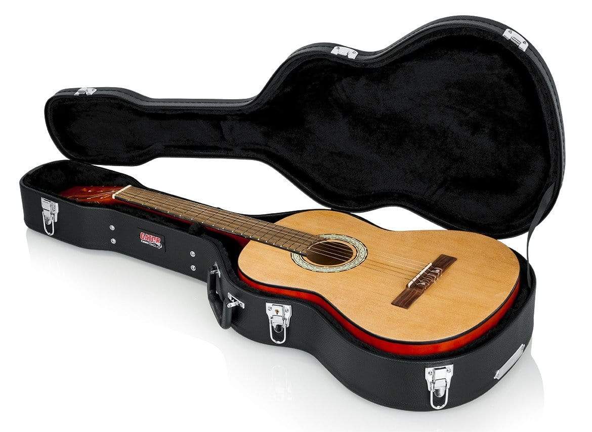 Gator Classical Guitar Case in hard-shell wood, shown open with a classical guitar inside, featuring plush lining and an ergonomic handle.