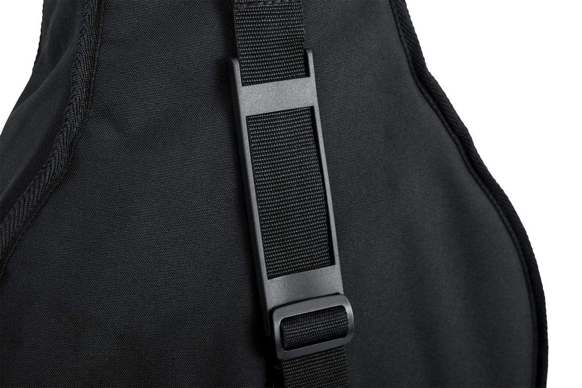 Gator Mini Acoustic Guitar Gig Bag with black strap, durable nylon exterior, foam padding, reinforced support, and exterior storage pocket.