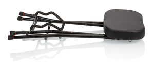 Gator Frameworks Guitar Stool with Integrated Guitar Stand featuring a padded seat, footrest, and fold-up guitar cradle.