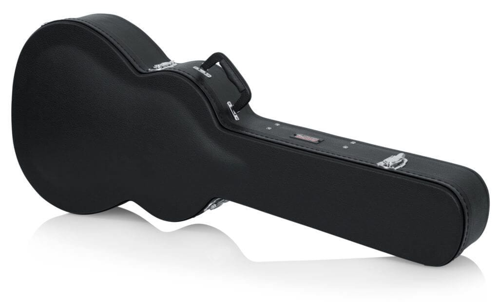 Gator Martin 000 Style Acoustic Guitar Case with silver handles, chrome lockable latches, and ergonomic carrying handle for secure and comfortable transport.