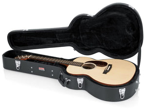 Gator Martin 000 Style Acoustic Guitar Case showcasing protective, black Tolex PVC exterior with plush interior, securely housing the guitar inside.