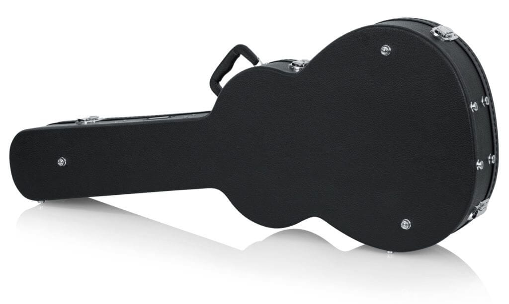Gator Martin 000 Style Acoustic Guitar Case featuring a black hard-shell design with a handle, chrome lockable latches, and plush interior lining for protection and storage.