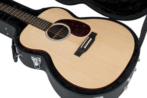 Gator Martin 000 Style Acoustic Guitar Case protecting a guitar, showcasing its durable build and secure fit, ideal for safeguarding 000 Acoustic guitars.