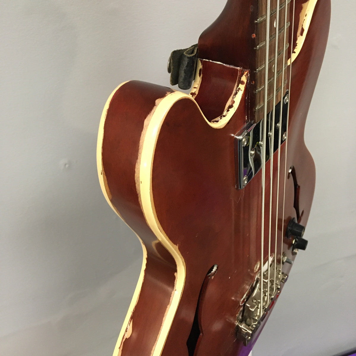 Gibson EB-2C 1958-1965 bass, vintage with modifications, shown broken on a stand. Suitable for collectors, available at Guitars on Main.