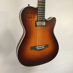 Godin A6 Ultra Baritone guitar with strings close-up, featuring a mini-humbucker and dual outputs for acoustic and electric play. Comes with a gig bag.