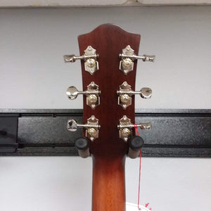 Back view of the Godin Imperial Laguna Blue GT EQ acoustic guitar, showcasing its solid mahogany body and intricate design.
