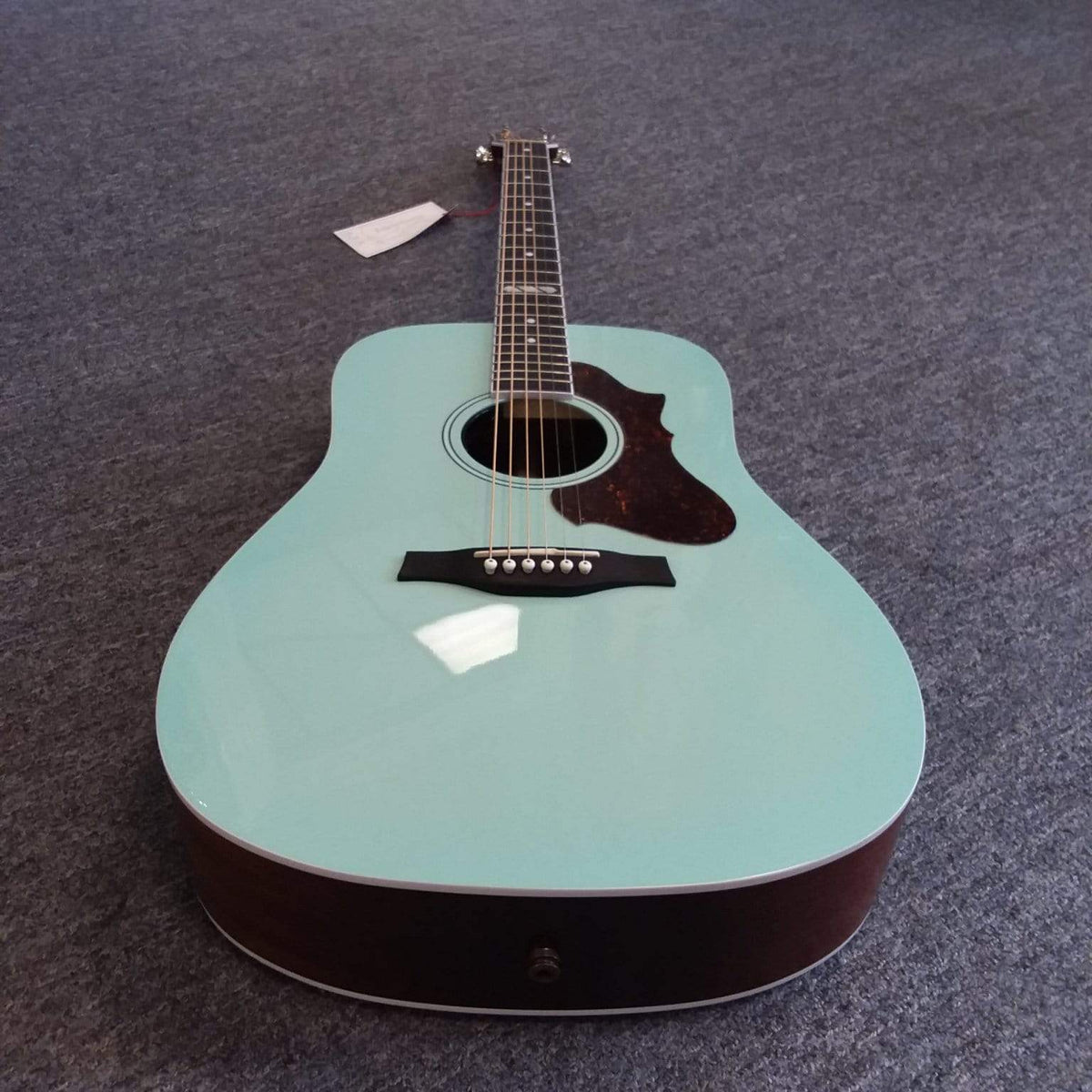 Godin Imperial Laguna Blue GT EQ acoustic guitar with solid Sitka spruce top and mahogany body, featuring LR Baggs Anthem system and Godin preamp/EQ control panel.