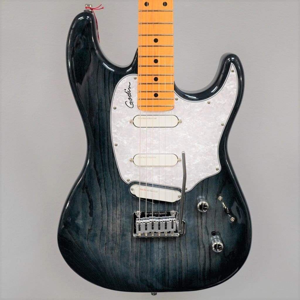 The Godin RG3 Passion Lace Sensor Hot Gold Indigo Blue electric guitar from Godin features three Lace Sensor Hot Gold single-coil pickups, a white pickguard, two control knobs, a five-way selector switch, and a tremolo bridge, shown on a gray background.