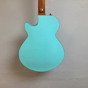 Godin Montreal Premiere HT Laguna Blue Blem with wooden handle, semi-hollow body, and gigbag. Ideal for jazz, blues, and rock players.