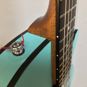 Close-up of the Godin Montreal Premiere HT Laguna Blue guitar, showcasing its semi-hollow body and high-quality finish.