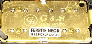 Gold and silver Godin Neck Humbucker pickup with NICKEL cover and attached black wire, shown in excellent pre-owned condition.