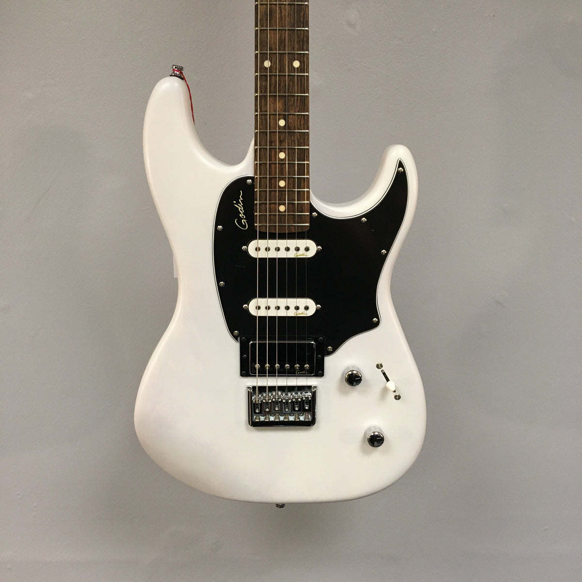 Godin Session HT Trans Cream RN electric guitar with hardtail bridge, H-S-S pickups, and maple neck.