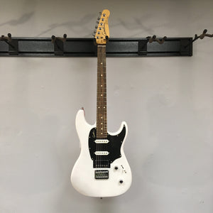 White Godin Session HT Trans Cream RN electric guitar with black and white accents, featuring a hardtail bridge and H-S-S pickup configuration for versatile tones.
