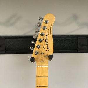 Close-up of the Godin Stadium HT Matte Black guitar neck, showcasing the knobs and pegs.