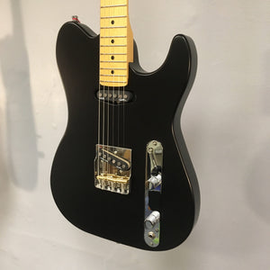 Godin Stadium HT Matte Black MN electric guitar with gold hardware, featuring a Hard Rock Maple Neck and Custom T-Ashtray Hardtail Bridge.