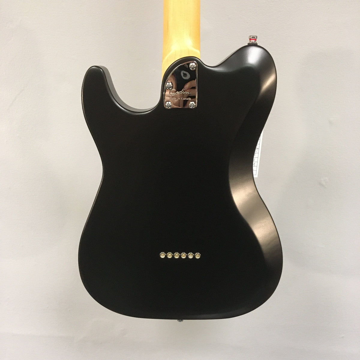 Godin Stadium HT Matte Black electric guitar with yellow handle, maple neck, and custom pickups.