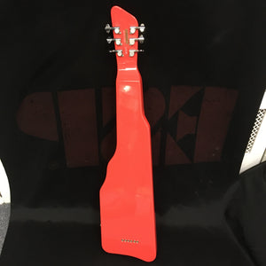 Gretsch G5700 Electromatic Lap Steel Refurb, shown on a black surface, highlighting its solid mahogany body and chrome-covered single-coil bridge pickup.