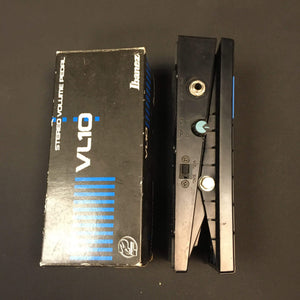 Ibanez VL10 Volume Pedal, featuring control buttons and visible text, designed for instrument volume control, shown on a black surface. Used in good condition.