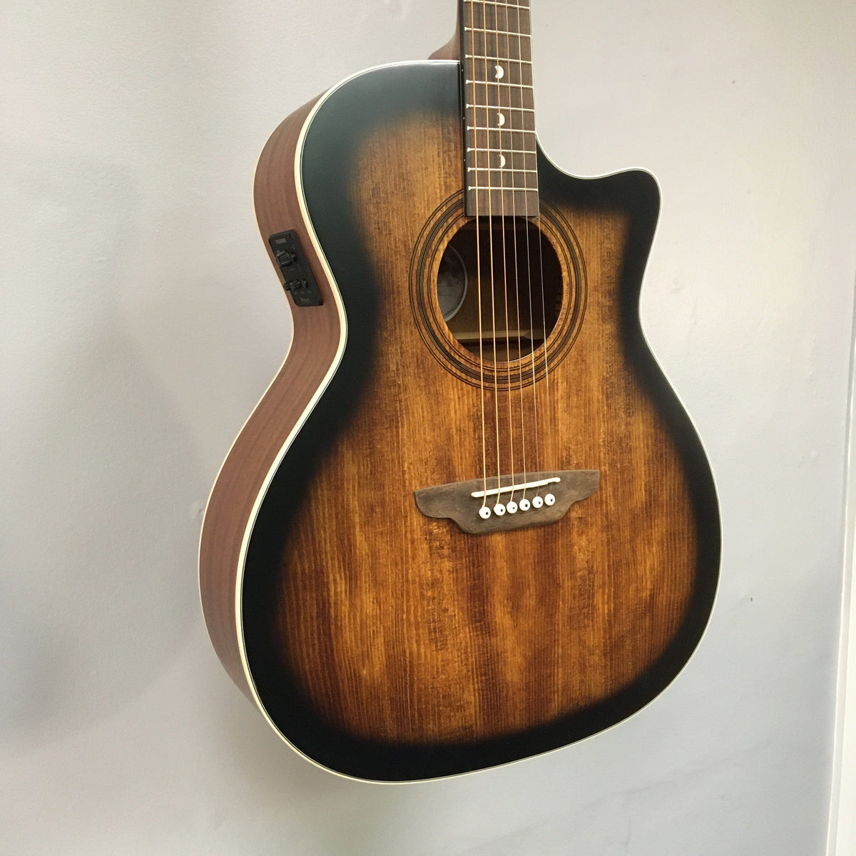 Luna Art Vintage Grand Auditorium Cutaway A/E guitar with solid spruce top and open gear tuners, featuring a Fishman Presys II preamp system.