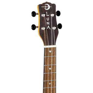 Close-up of Luna Uke Vintage Mahogany Baritone w/preamp, featuring walnut bridge, fretboard, and laser-etched rosette design around the sound hole.