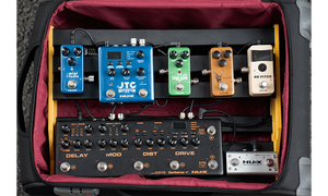 NUX Bumblebee-M Pedal Board w/Bag, featuring customizable multicolored pedals in a compact case for efficient assembly.