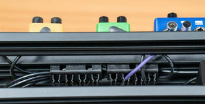 Close-up of the NUX Bumblebee-M Pedal Board, showcasing its customizable platform design for efficient pedal arrangement.