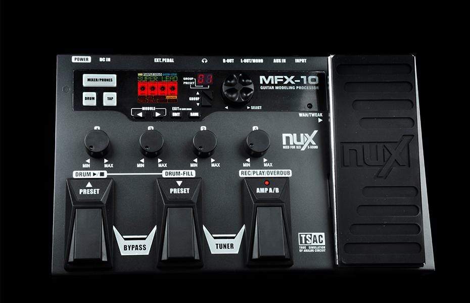 Nux MFX-10 Multi-Effects Processor with dials, buttons, and a large backlit LCD screen for guitar amps and effects.