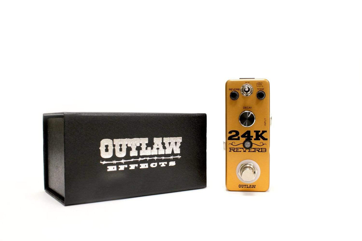 Outlaw 24K Reverb Guitar Pedal next to its black box, featuring three reverb modes: Room, Plate, and Spring for versatile sound enhancement.