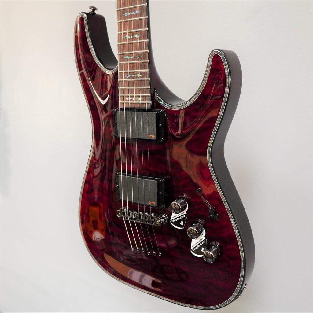 Schecter Hellraiser C-1 Black Cherry Electric Guitar, featuring a black cherry finish, displayed on a wall.