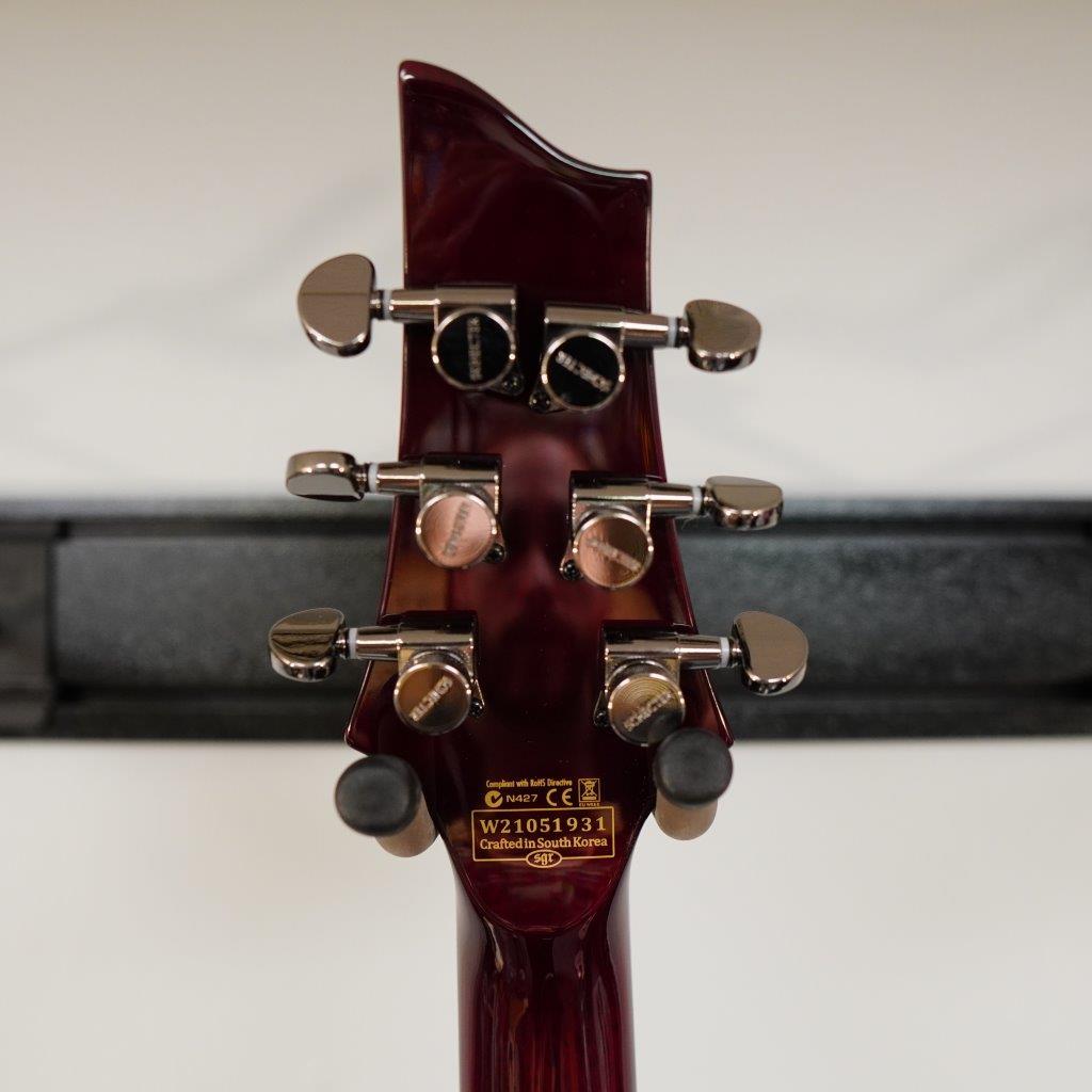 Schecter Hellraiser C-1 Black Cherry Electric Guitar with locking tuners, arched top, and gothic cross inlays for rock and metal enthusiasts.