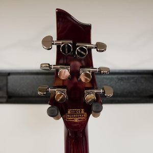Schecter Hellraiser C-1 Black Cherry Electric Guitar with locking tuners, arched top, and gothic cross inlays for rock and metal enthusiasts.