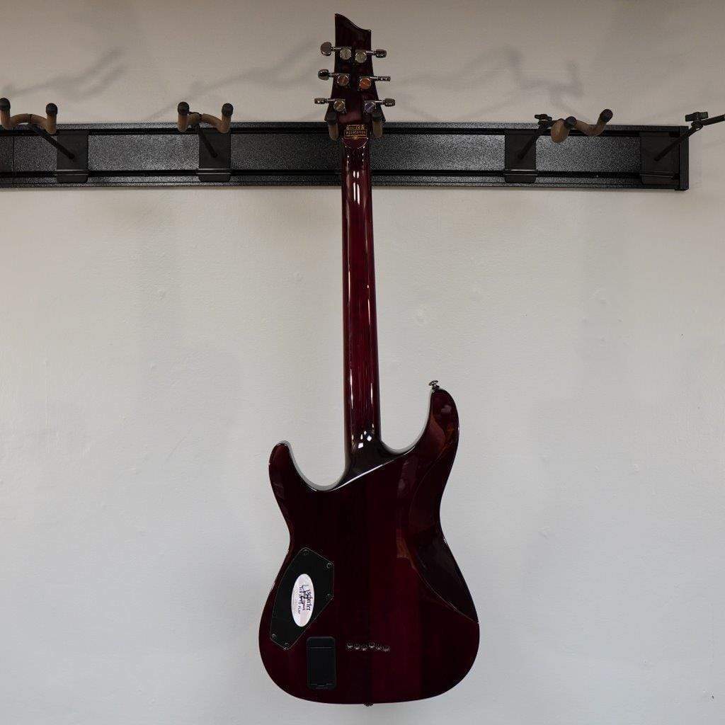 Schecter Hellraiser C-1 Black Cherry (BCH) electric guitar on display, highlighting its sleek design, gothic cross inlays, and black chrome hardware.