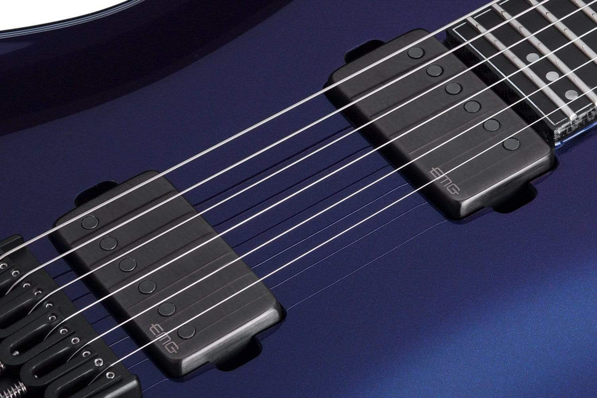 Close-up of the Schecter Hellraiser Hybrid PT Ultra Violet guitar, showcasing its strings, pickups, and intricate body design.