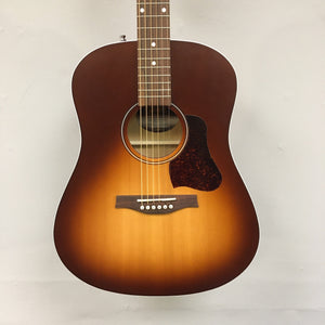 A Seagull Entourage Autumn Burst Acoustic Guitar by Seagull is displayed against a plain light background, featuring six strings, white dot fret markers, and a teardrop-shaped tortoiseshell pickguard.