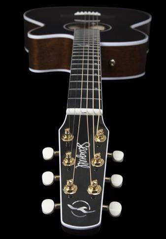 Close-up of a Seagull Artist Mosaic CH CW Acoustic-Electric Guitar - Bourbon Burst, showing gold tuning pegs, six strings, and the Seagull logo on the headstock, all set against a black background.