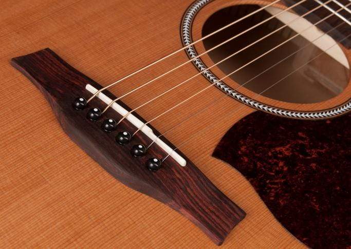 Seagull S6 Original Acoustic Guitar close-up, showcasing its strings and solid cedar top.
