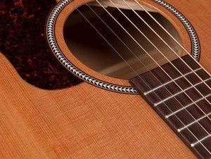 Close-up of the Seagull S6 Original Acoustic Guitar, featuring its cedar top and strings.