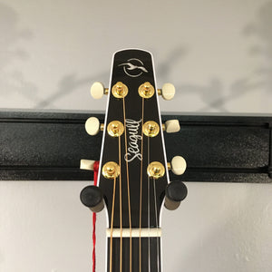 Seagull Artist Mosaic CH CW GT EQ Bourbon Burst guitar headstock with tuning pegs and neck.