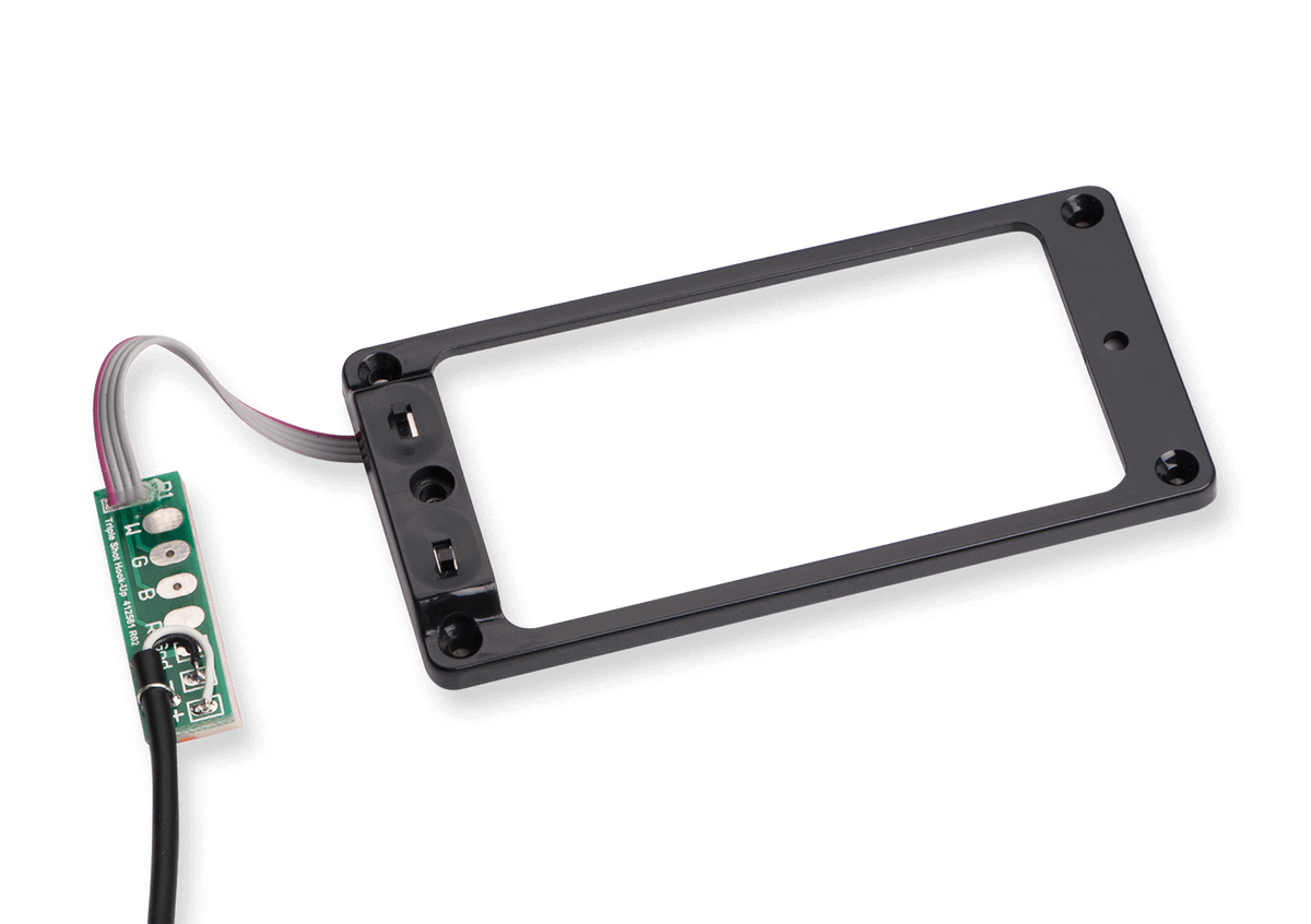 Seymour Duncan TS-1 Triple Shot Mounting Ring Black with switches attached to a green circuit board for tonal variety in pickups.