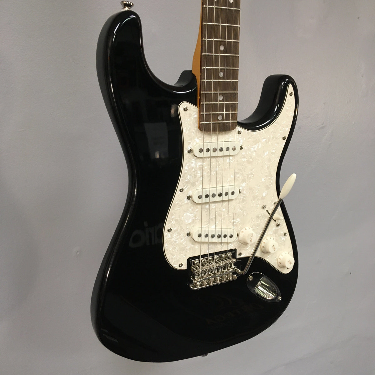 Squier Classic Vibe '70s Stratocaster Black Refurb with large headstock, nickel-plated hardware, and Fender-designed alnico pickups.