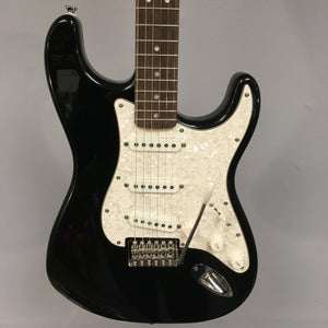 Squier Classic Vibe '70s Stratocaster Black Refurb, highlighting close-up views of its neck, strings, and knobs, showcasing its vintage-style features.