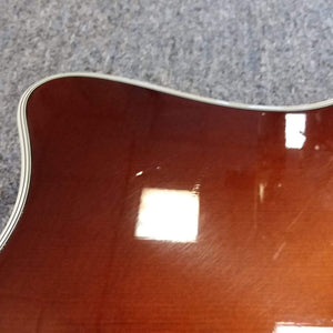 Taylor T5-C 2006 guitar with Custom Fishman Matrix Piezo, close-up view of strings and body, showcasing its detailed craftsmanship and setup.