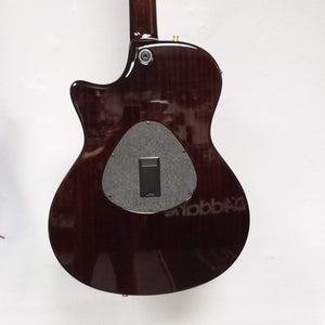 Close-up of a Taylor T5-C 2006 guitar with Custom Fishman Matrix Piezo, highlighting the body sensor pickup and strings.