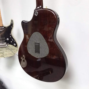 Taylor T5-C 2006 guitar with Custom Fishman Matrix Piezo pickup, displayed against a white wall.