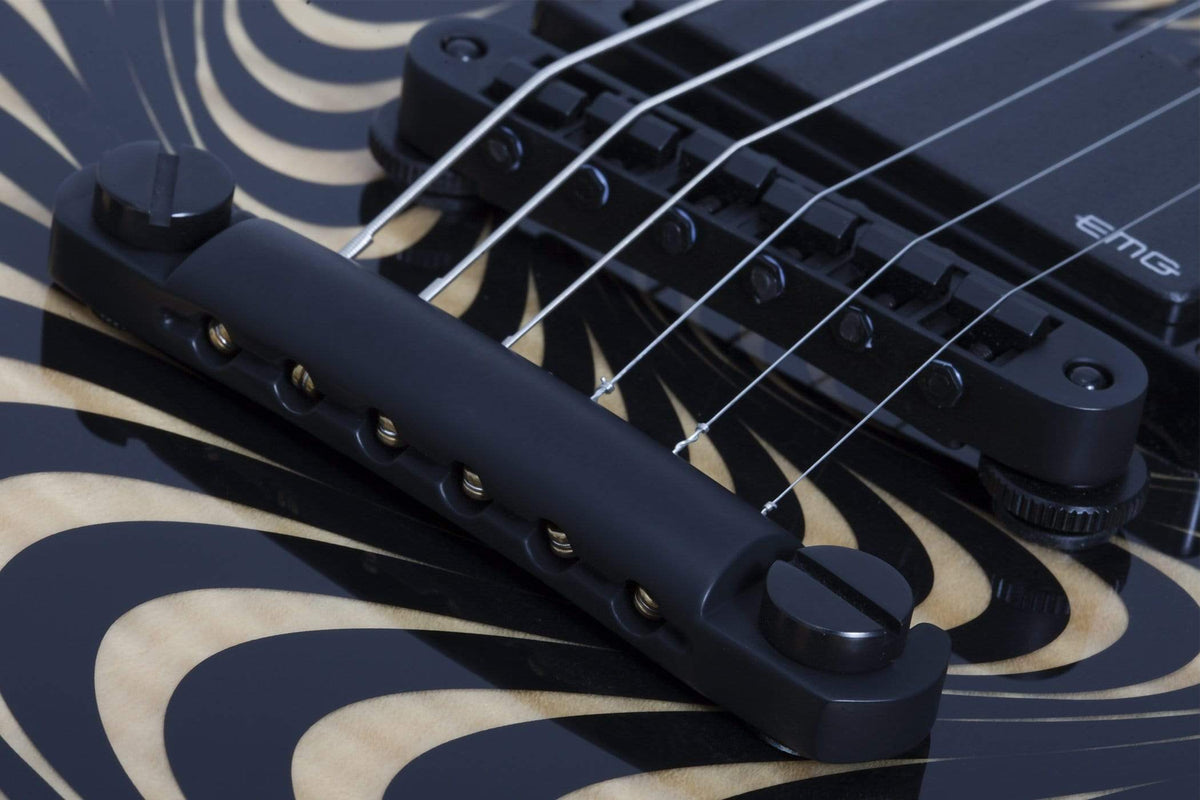 Close-up of Wylde Audio Barbarian Psychic Bullseye Electric Guitar showcasing strings and intricate fretboard details.