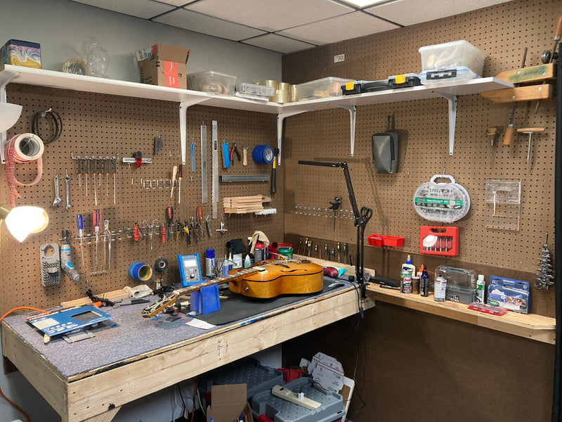 A guitar on service bench