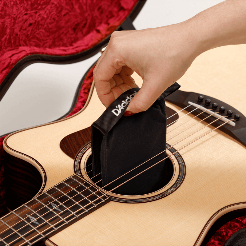 D'Addario Humidipak getting installed into an acoustic guitar