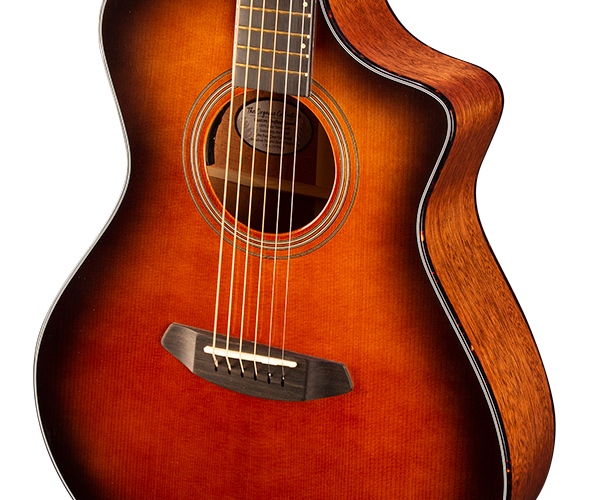 Close-up of an Breedlove acoustic guitar, highlighting its strings and body, reflecting Guitars on Main's focus on quality musical instruments and craftsmanship.