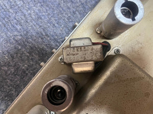 Close-up of a metal transformer labeled "125A20B 606" inside a Fender 1965 Deluxe Reverb AB763 (Pre-CBS Blackface, Serial A 06439) tube amp, showing vacuum tube sockets and classic components.